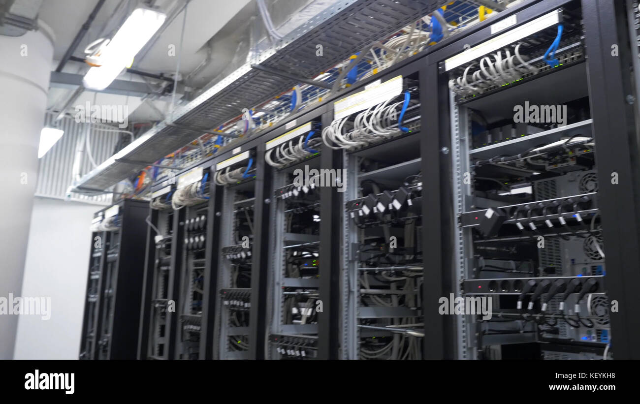 Row Of Bit!   coin Miners Set Up On The Wired Shelfs Computer For Stock - 